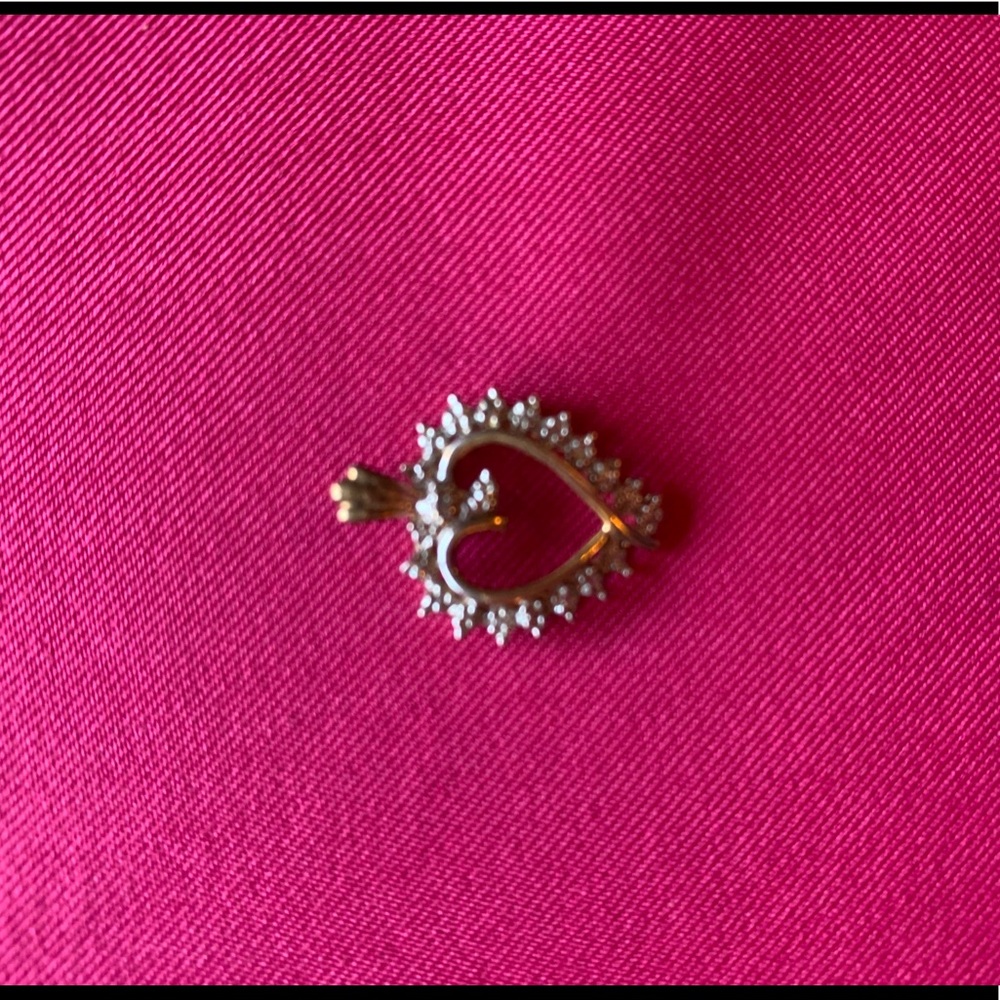 Diamond and gold heart pendant